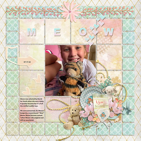 Design a baby's first-year photo book/scrapbook full of cuddling memories